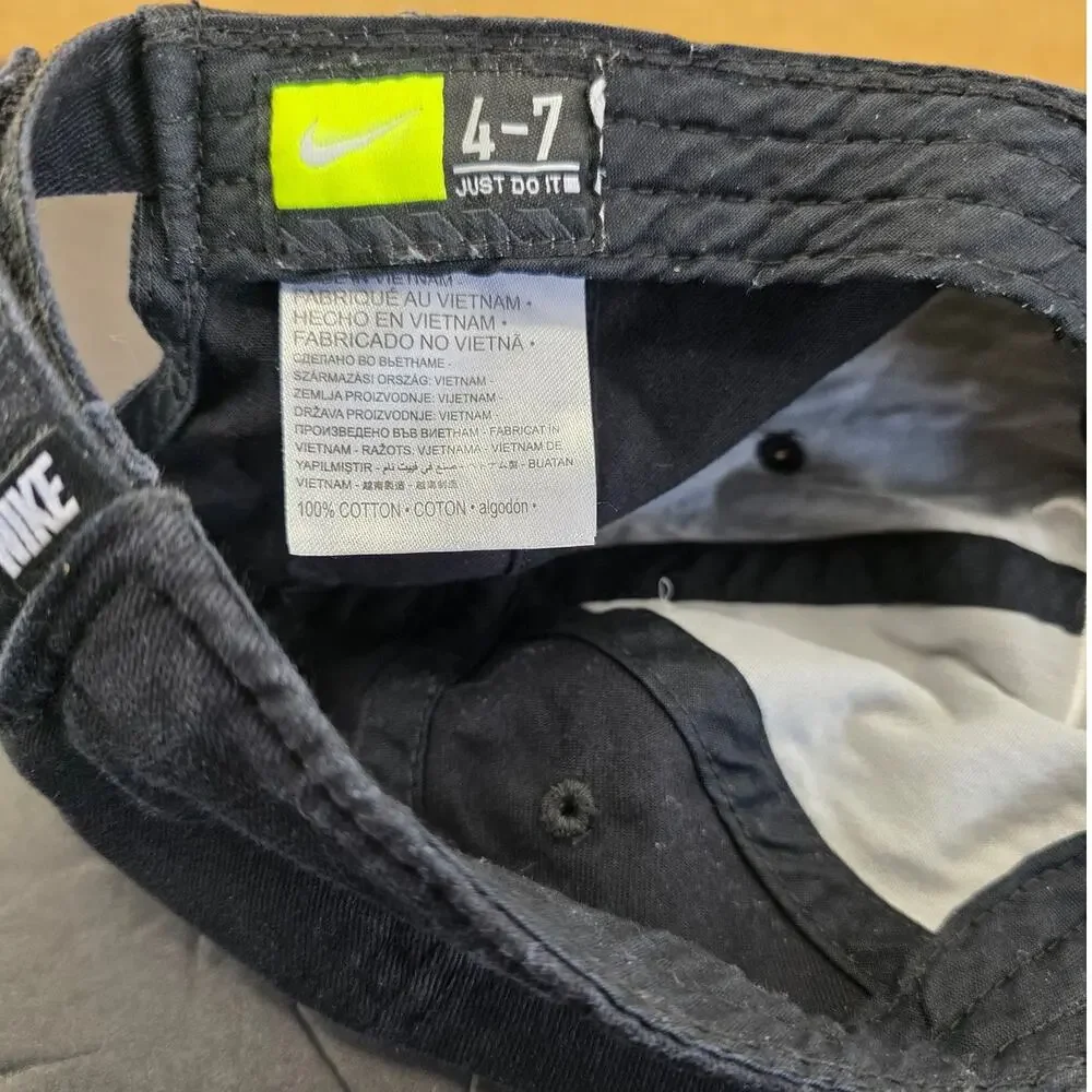Nike kids' baseball hat features an adjustable strap